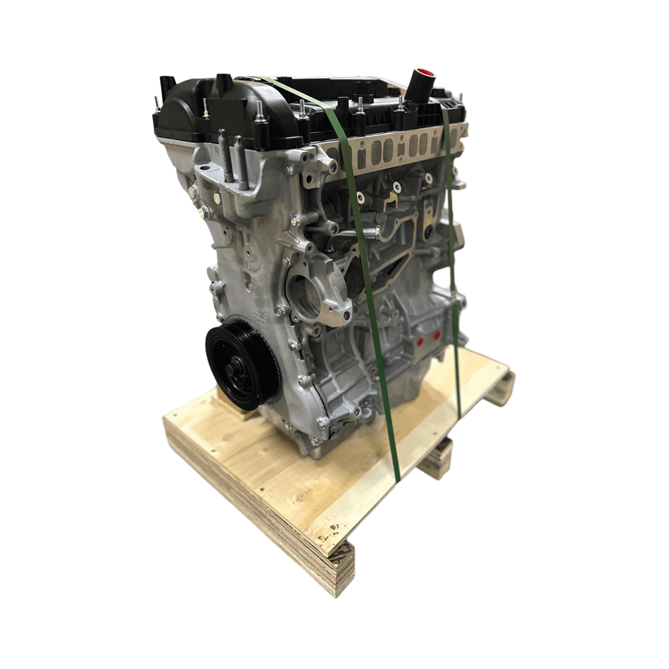 Remanufactured 2.0L Ford Fusion Turbo 4-Cylinder Engine on wooden pallet, featuring robust construction.