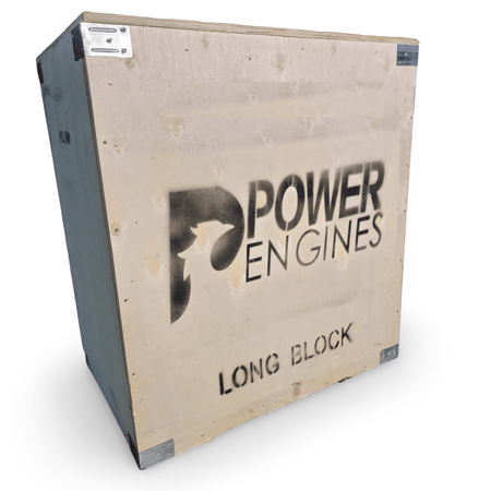 Shipping crate for Power Engines long block engine, featuring durable wood construction and brand logo.